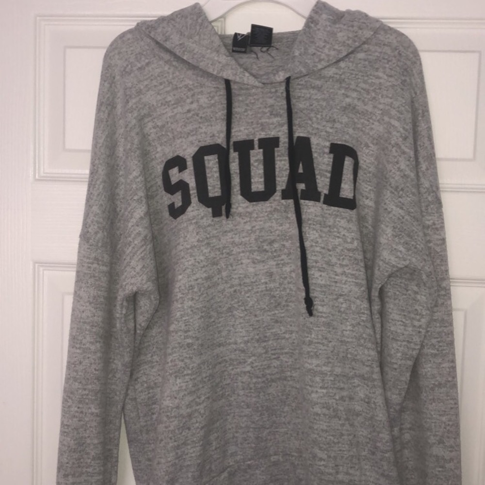 Sweatshirt with “squad” across it.